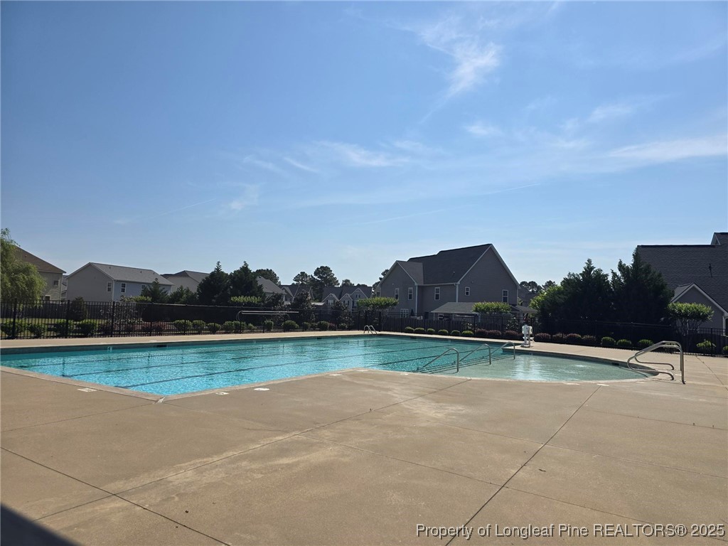 604 Amusement Drive Hope Mills, NC 28348 - Photo 39 of 41 a view of a lake and a mountain in the background