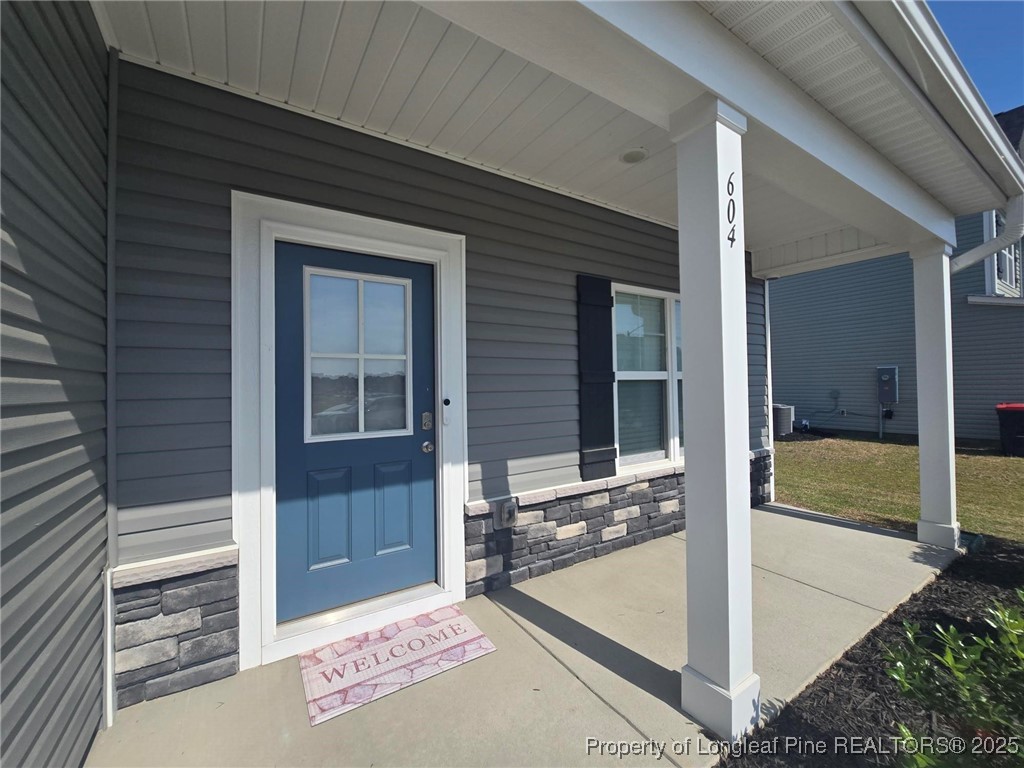604 Amusement Drive Hope Mills, NC 28348 - Photo 4 of 41 a view of a entryway door front of house