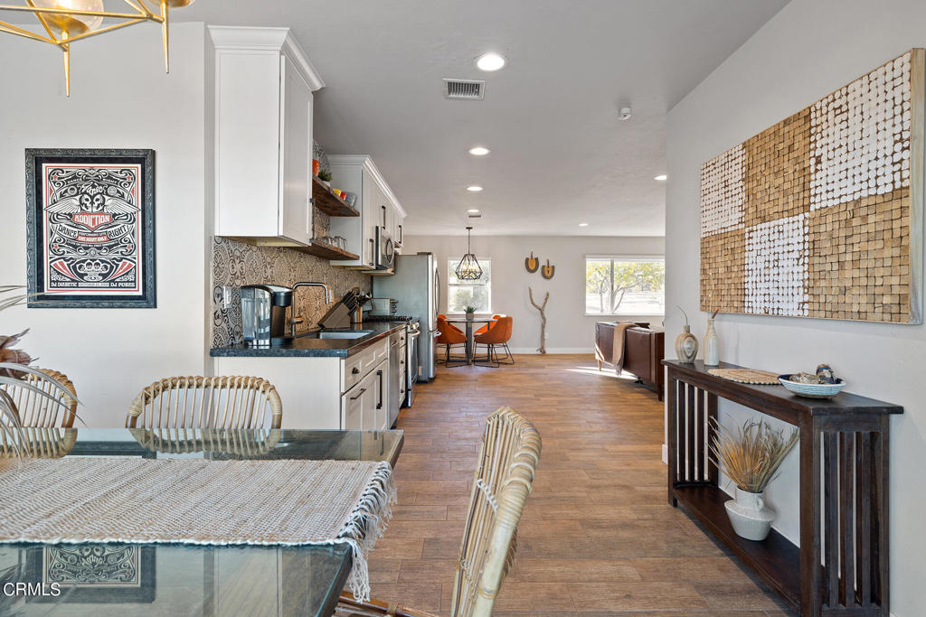 4741 Avenida Del Sol Joshua Tree, CA 92252 - Photo 13 of 52 a living room with furniture and a table