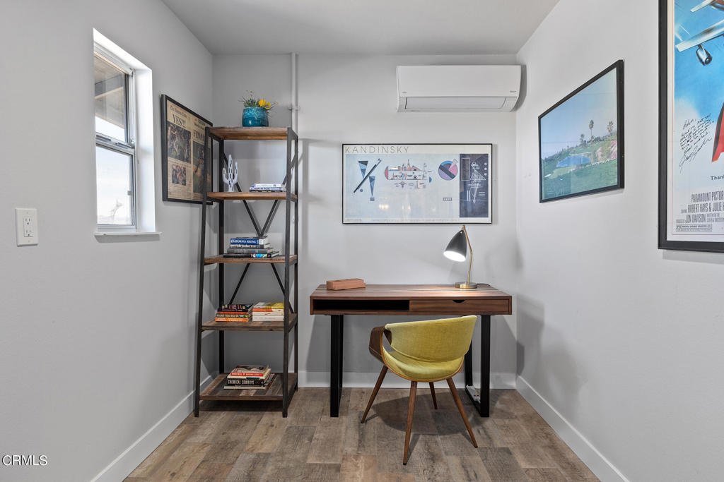 4741 Avenida Del Sol Joshua Tree, CA 92252 - Photo 29 of 52 a view of a workspace with furniture and a window
