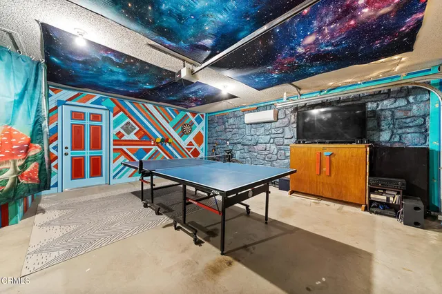 a view of a swimming pool with outdoor seating