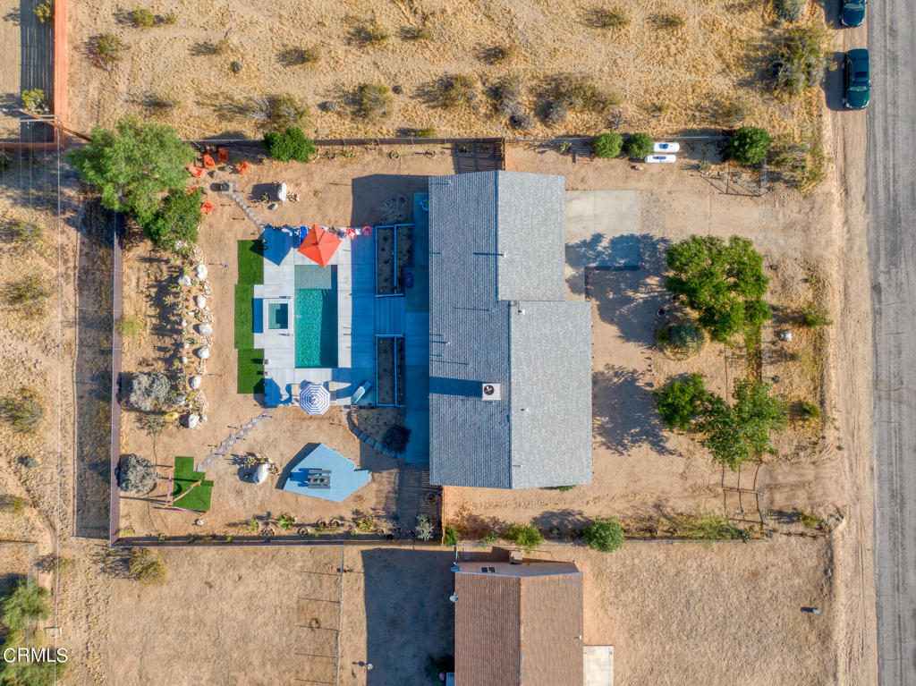 4741 Avenida Del Sol Joshua Tree, CA 92252 - Photo 38 of 52 front view of a house with a potted plant