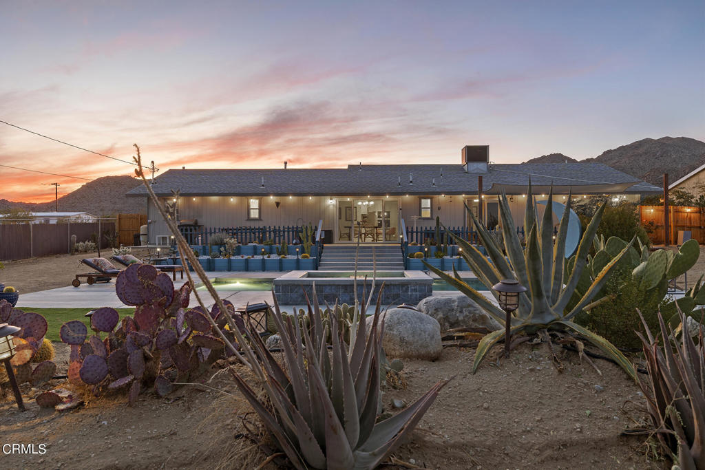 4741 Avenida Del Sol Joshua Tree, CA 92252 - Photo 41 of 52 a balcony with outdoor seating and city view