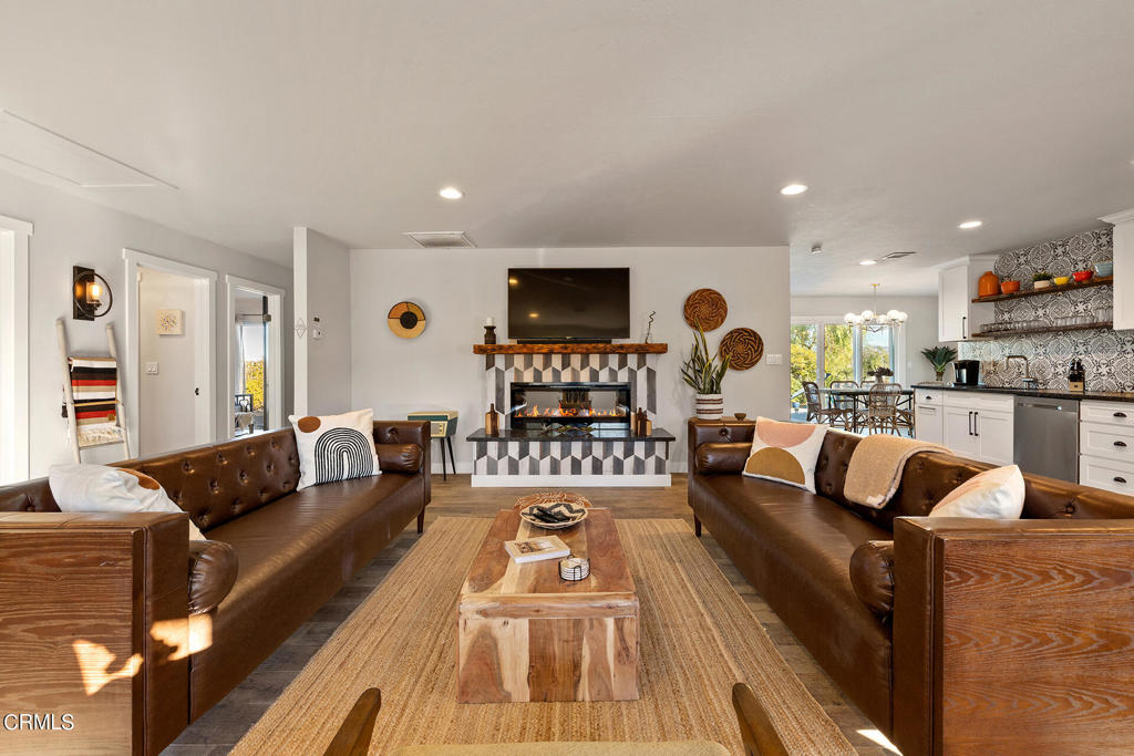 4741 Avenida Del Sol Joshua Tree, CA 92252 - Photo 5 of 52 a living room with furniture and a flat screen tv