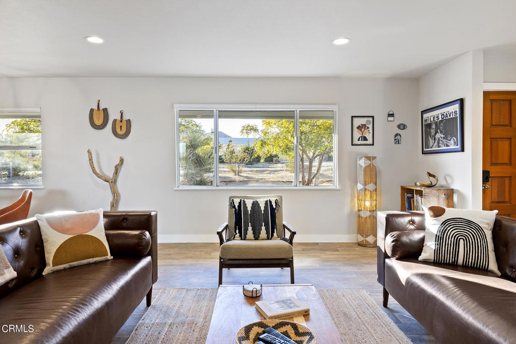 4741 Avenida Del Sol Joshua Tree, CA 92252 - Photo 8 of 52 a bedroom with furniture and a window