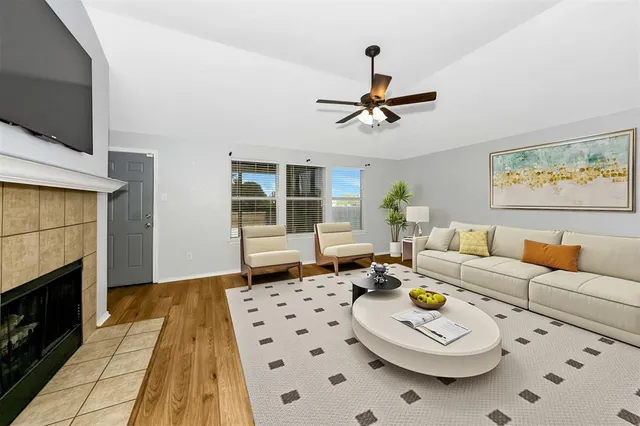 a living room with a fireplace