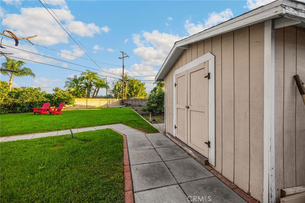 622 Linden Way Brea, CA 92821 - Photo 17 of 19 a view of backyard with flowers and a garden