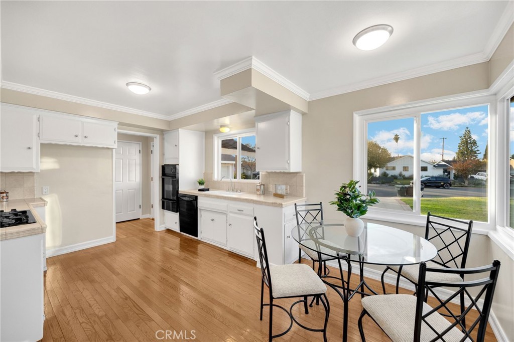 622 Linden Way Brea, CA 92821 - Photo 3 of 19 a kitchen with a table and chairs in it