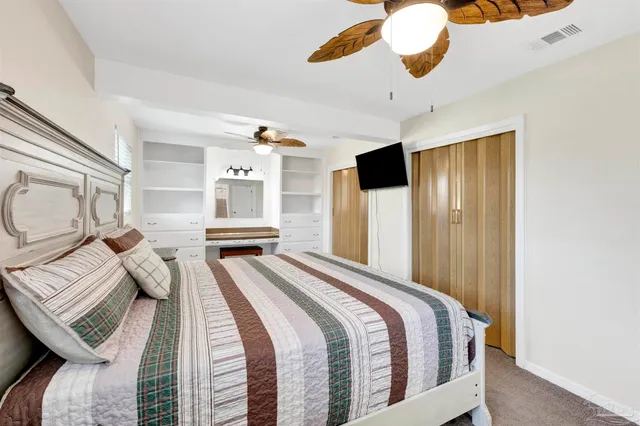 a bathroom with a sink a mirror and shower