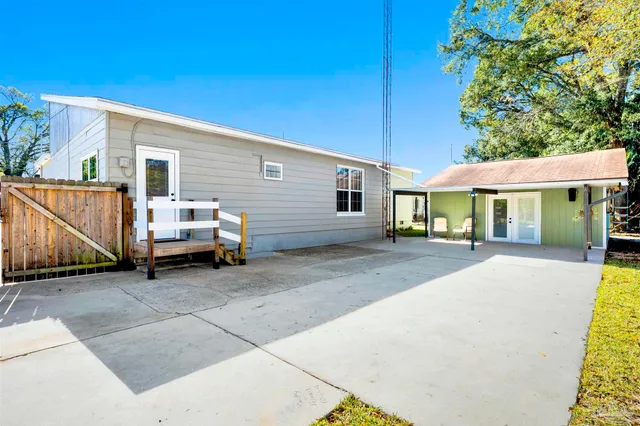 a view of swimming pool with outdoor seating