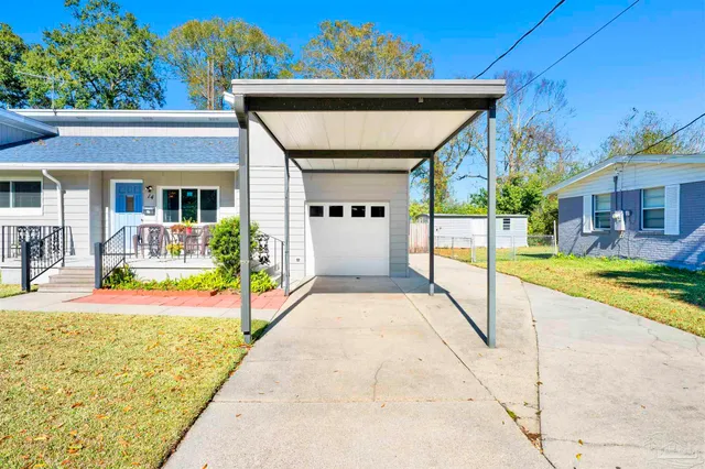 a view of a car parked in front of a house