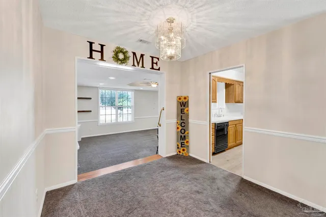 a view of livingroom with kitchen