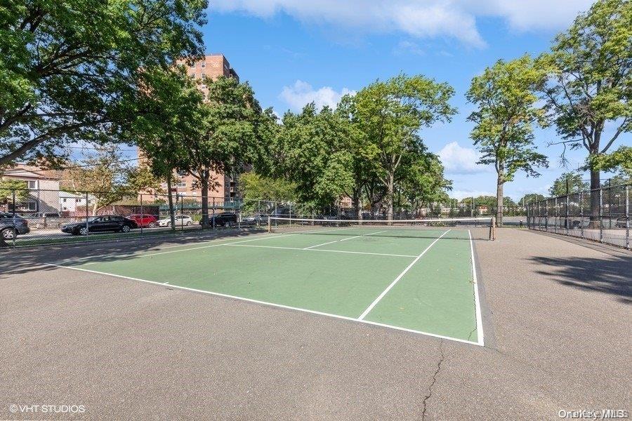 61-20 Grand Central Parkway, Unit A1402 Queens, NY 11375 - Photo 7 of 8 a view of a tennis court
