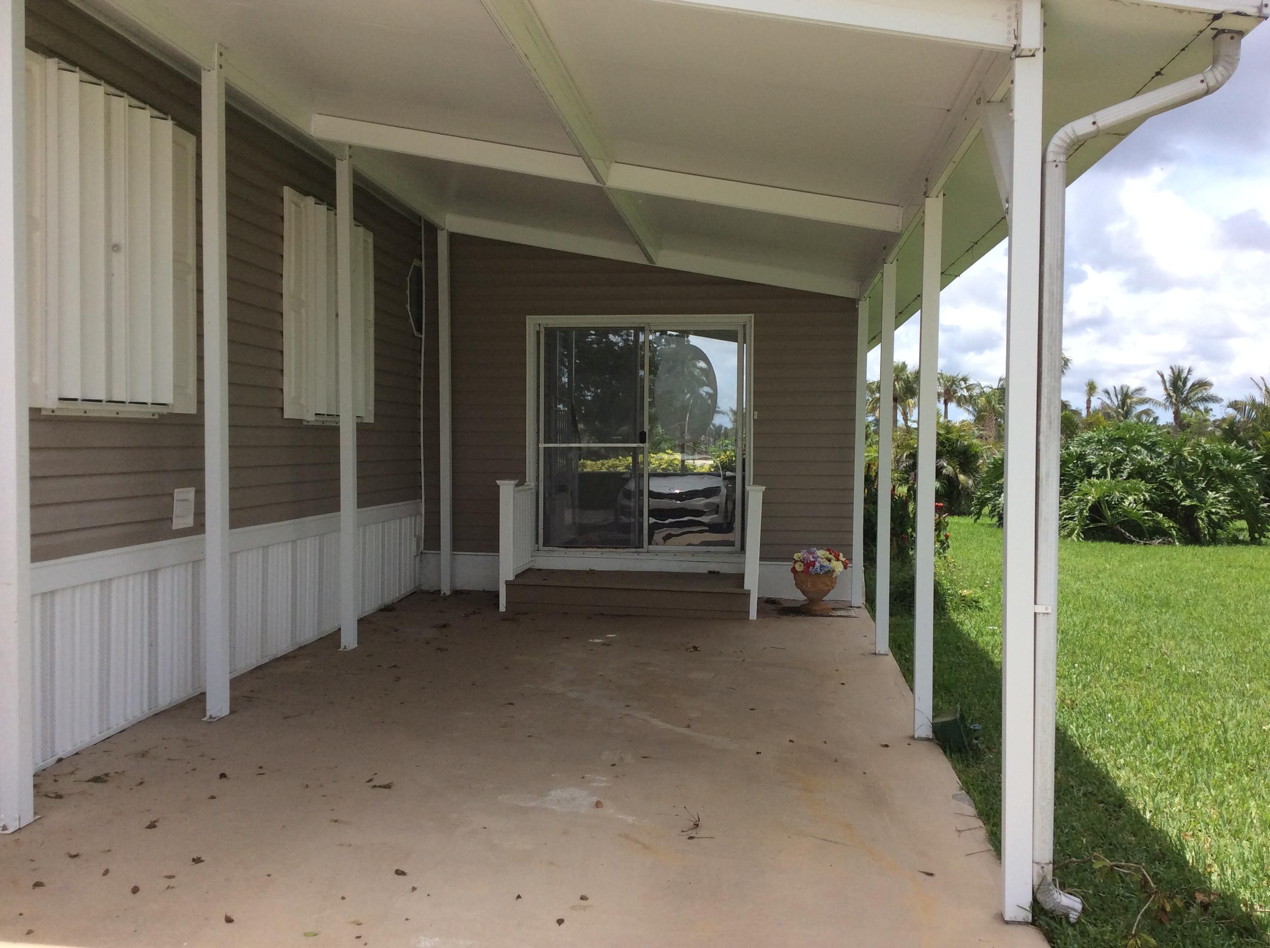 1540 Southwest 64th Way Boca Raton, FL 33428 - Photo 2 of 17 Car Port