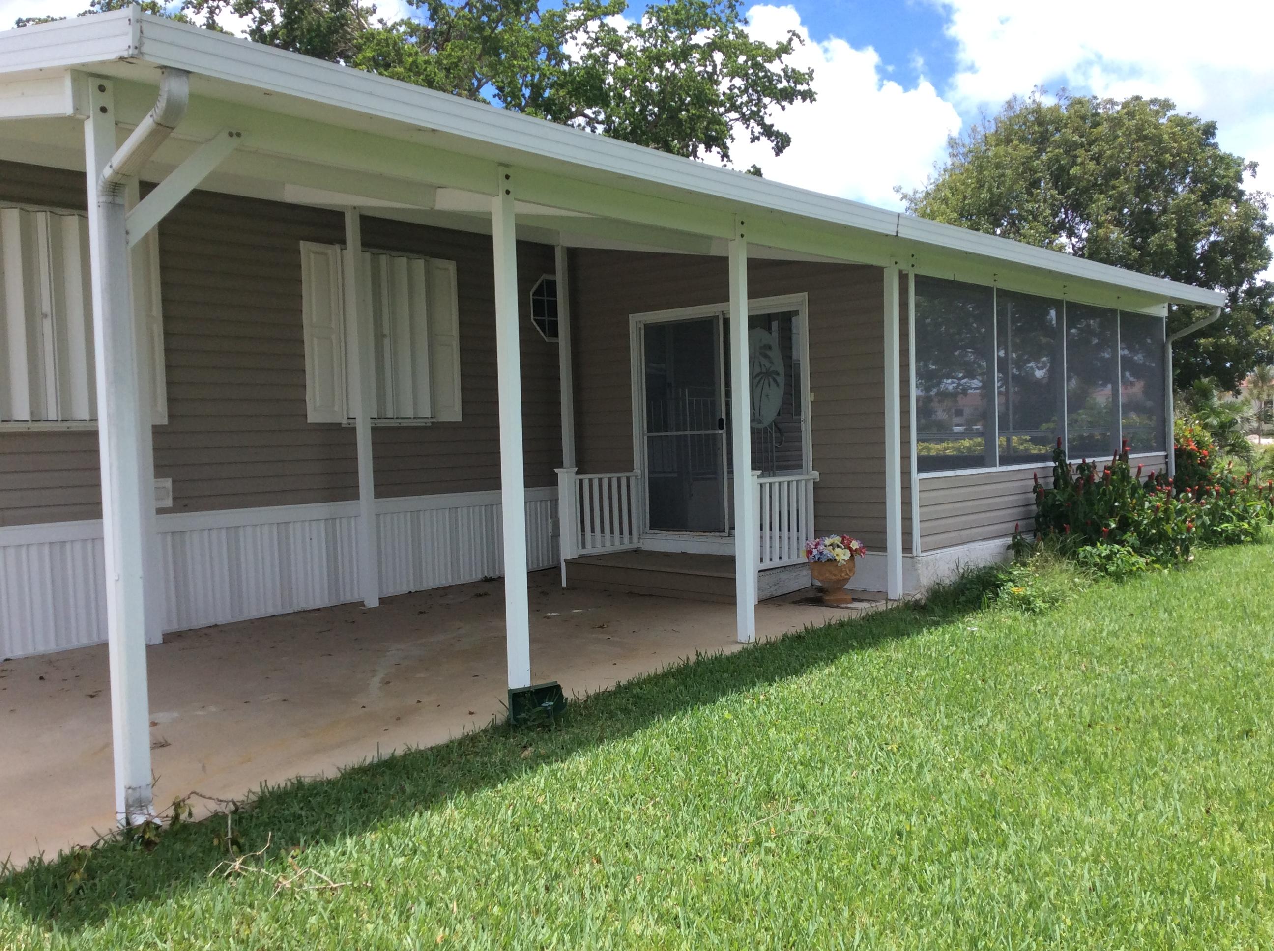 1540 Southwest 64th Way Boca Raton, FL 33428 - Photo 3 of 17 Car port