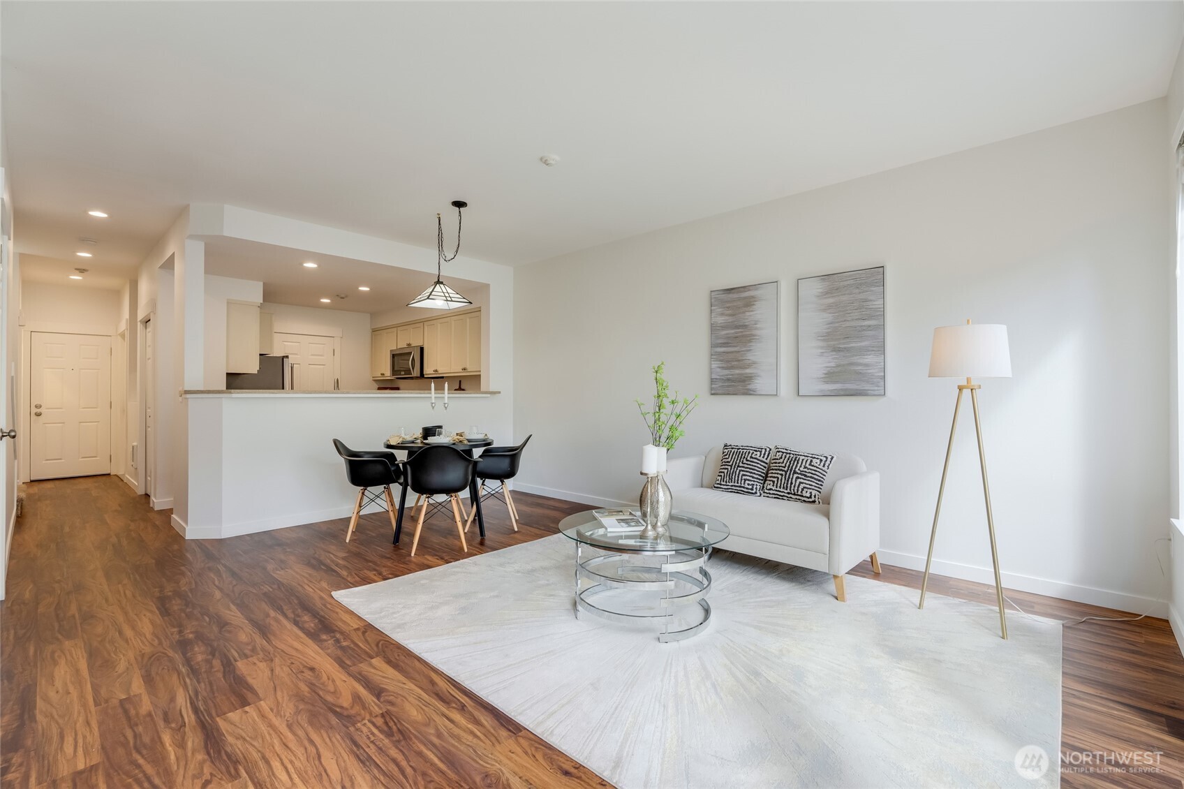 23908 Bothell Everett Highway, Unit C4 Bothell, WA 98021 - Photo 13 of 33 a living room with furniture and a wooden floor