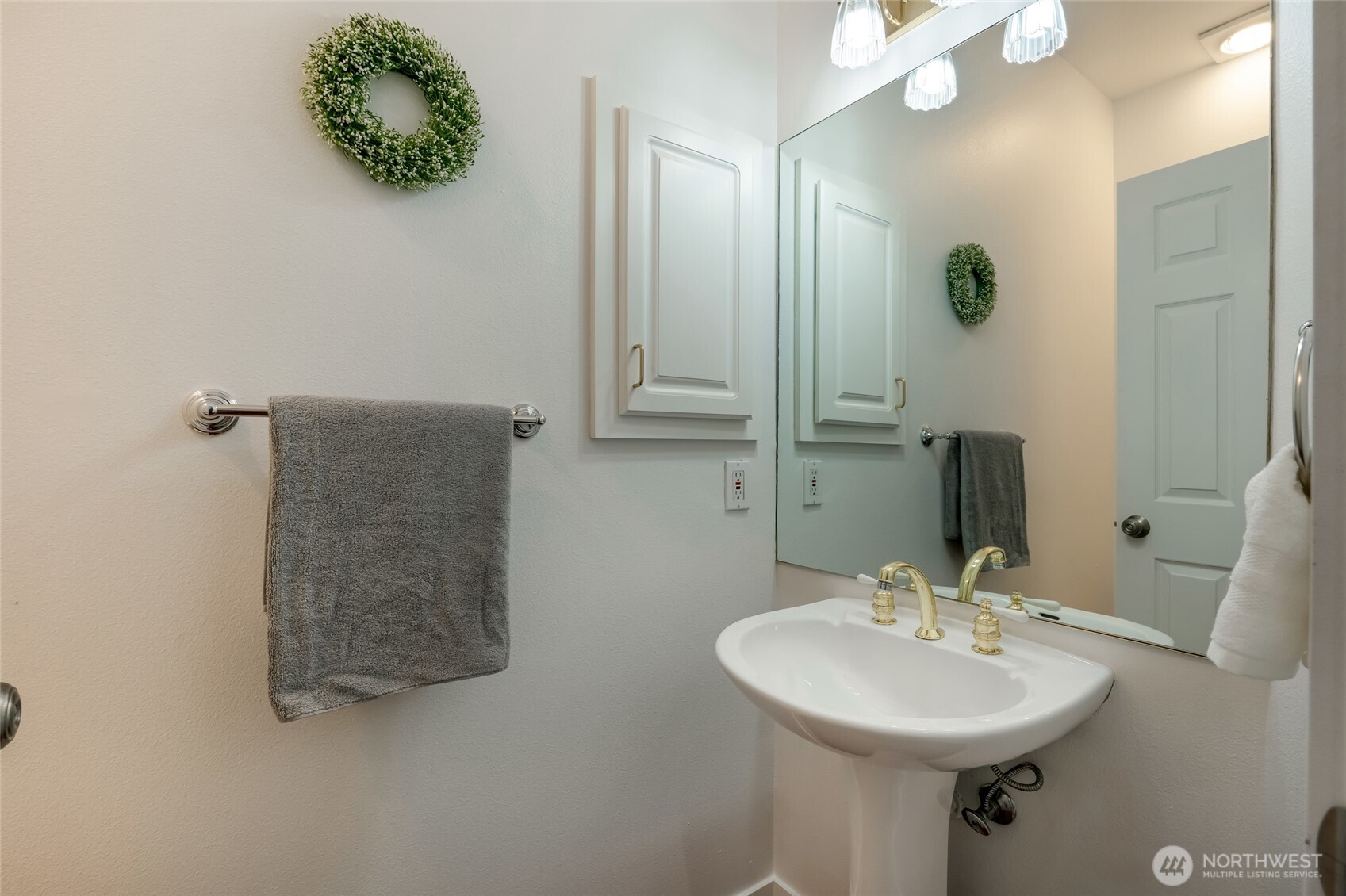 23908 Bothell Everett Highway, Unit C4 Bothell, WA 98021 - Photo 14 of 33 a bathroom with a sink and a mirror