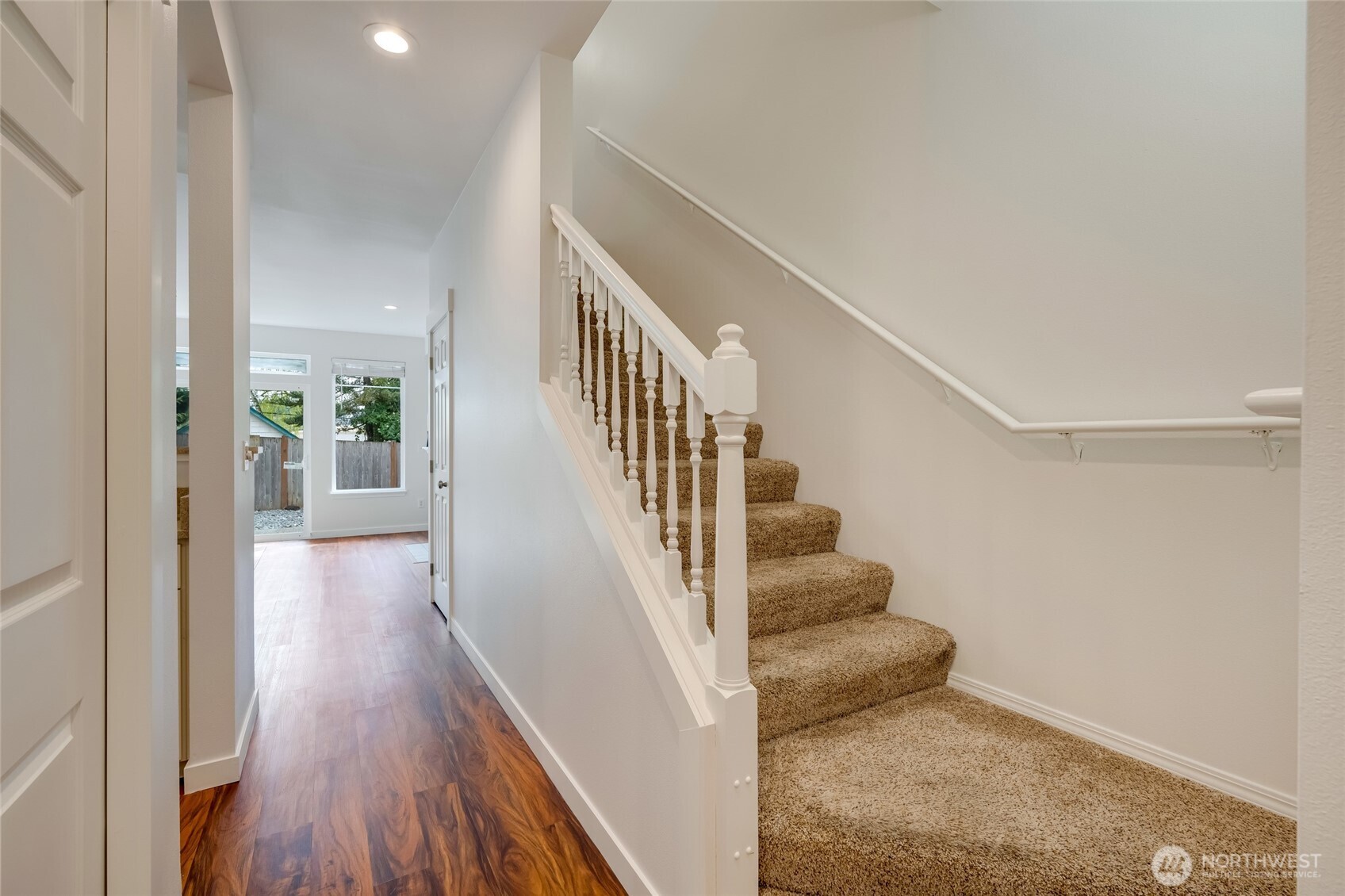 23908 Bothell Everett Highway, Unit C4 Bothell, WA 98021 - Photo 15 of 33 a view of entryway and hall with wooden floor
