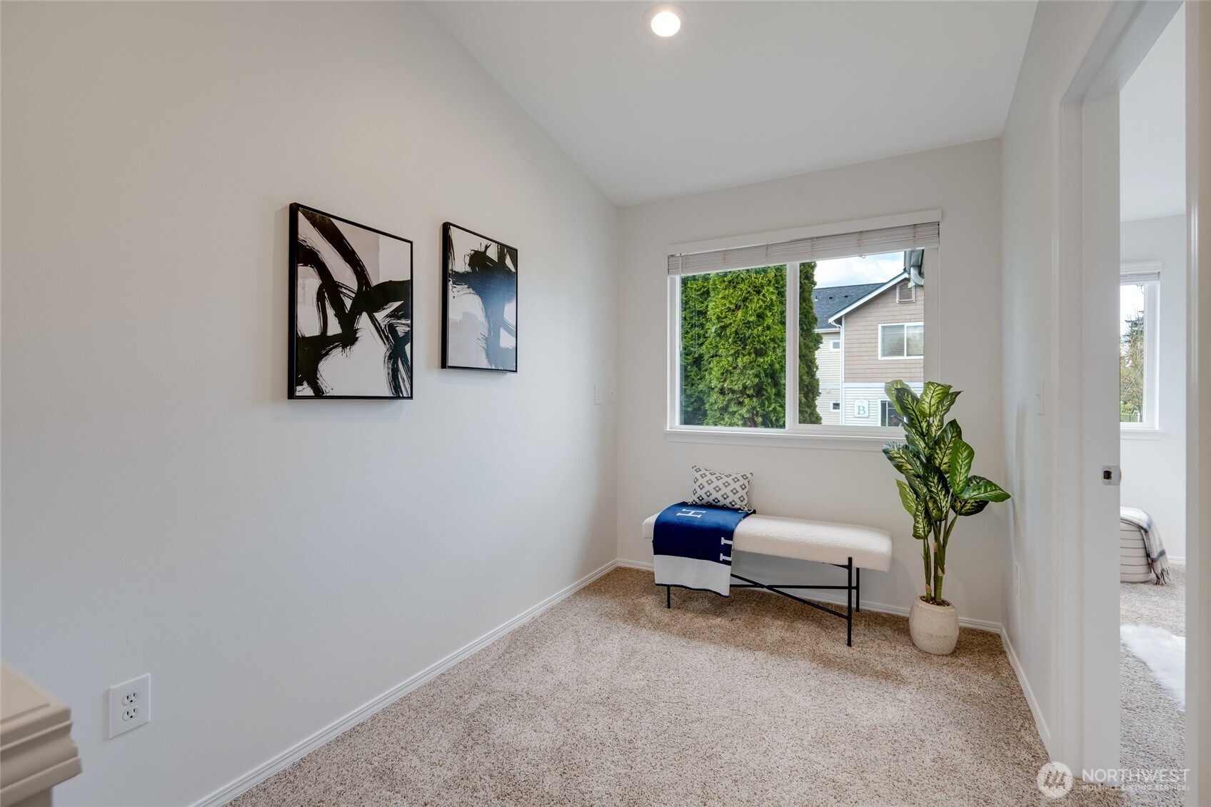 23908 Bothell Everett Highway, Unit C4 Bothell, WA 98021 - Photo 22 of 33 a living room with furniture and a potted plant