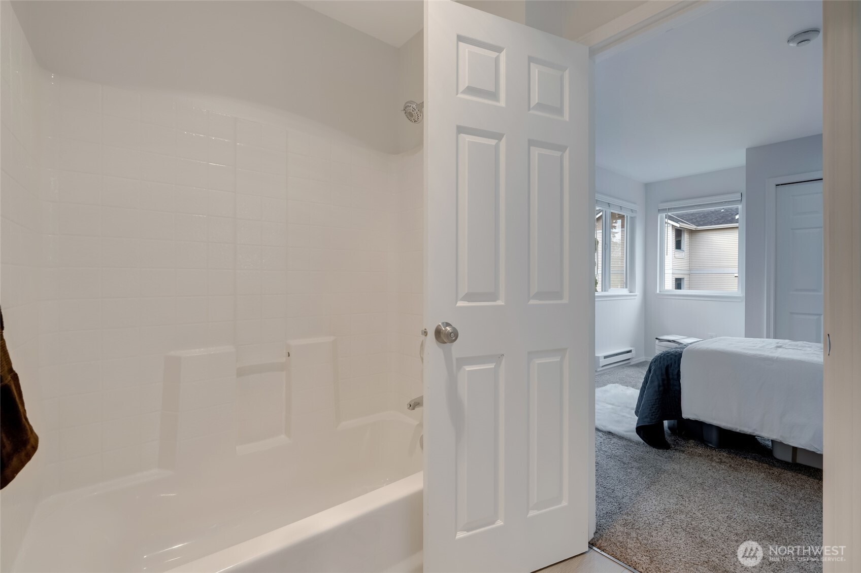 23908 Bothell Everett Highway, Unit C4 Bothell, WA 98021 - Photo 25 of 33 a bathroom with a bathtub and a shower