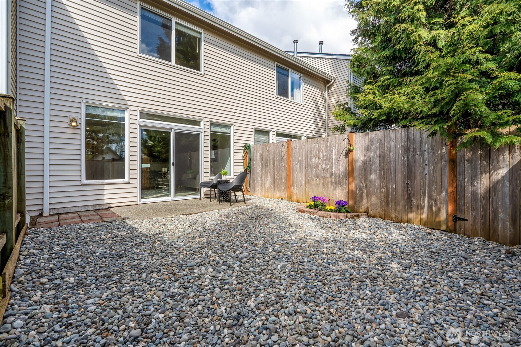 23908 Bothell Everett Highway, Unit C4 Bothell, WA 98021 - Photo 27 of 33 a view of a house with a backyard