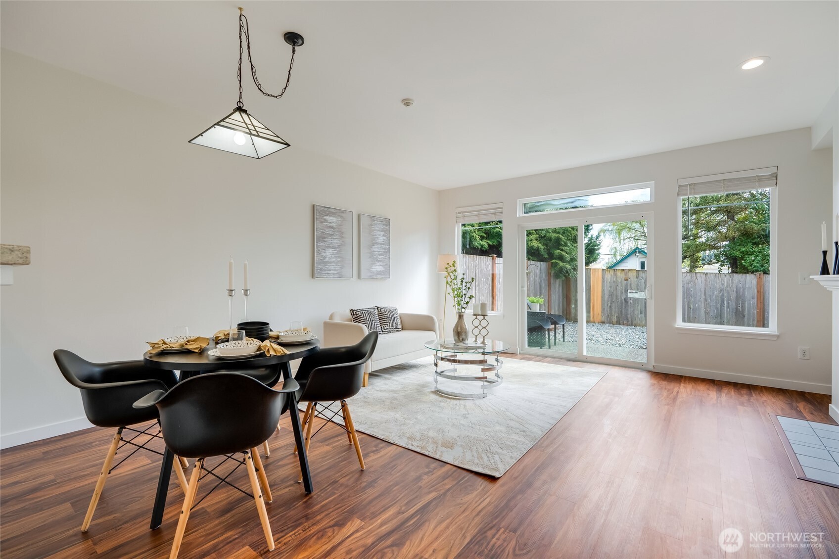 23908 Bothell Everett Highway, Unit C4 Bothell, WA 98021 - Photo 9 of 33 a view of a dining room with furniture window and wooden floor
