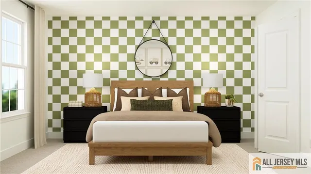 a bedroom with a bed and a mirror