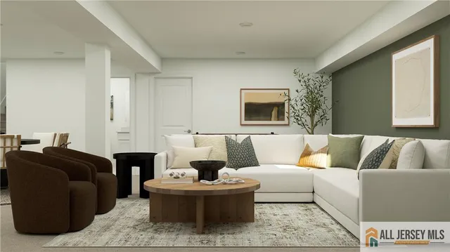 a living room with furniture and a potted plant