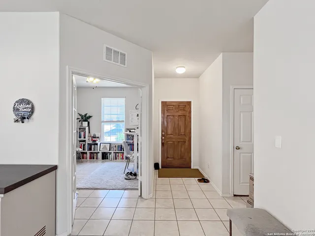 a view of an entryway with a livingroom