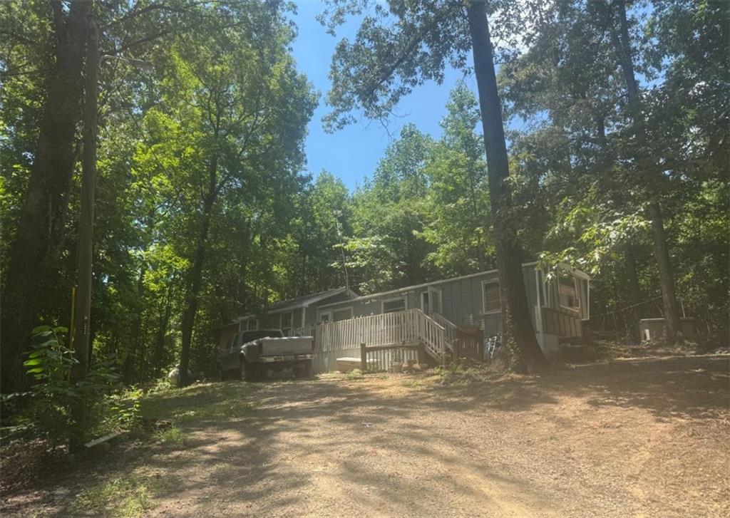 4740 East Hall Road Gainesville, GA 30507 - Photo 1 of 1 a view of a field with a tree
