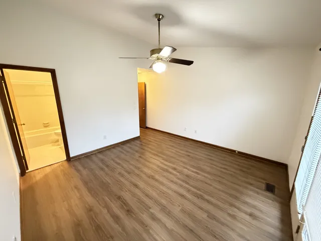 a bathroom with a sink toilet tub and shower