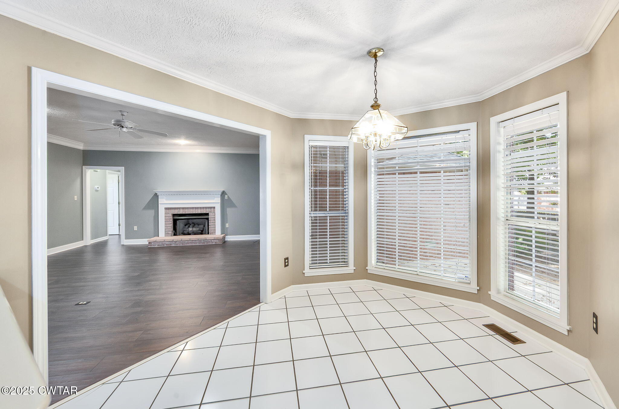11 Deer Pointe Jackson, TN 38305 - Photo 12 of 30 a view of a room with window and chandelier