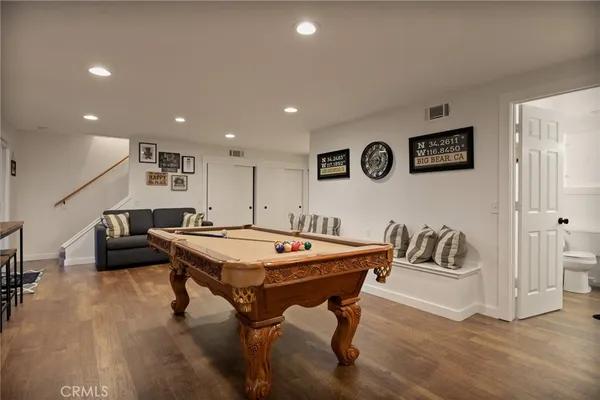a view of a livingroom with furniture and window