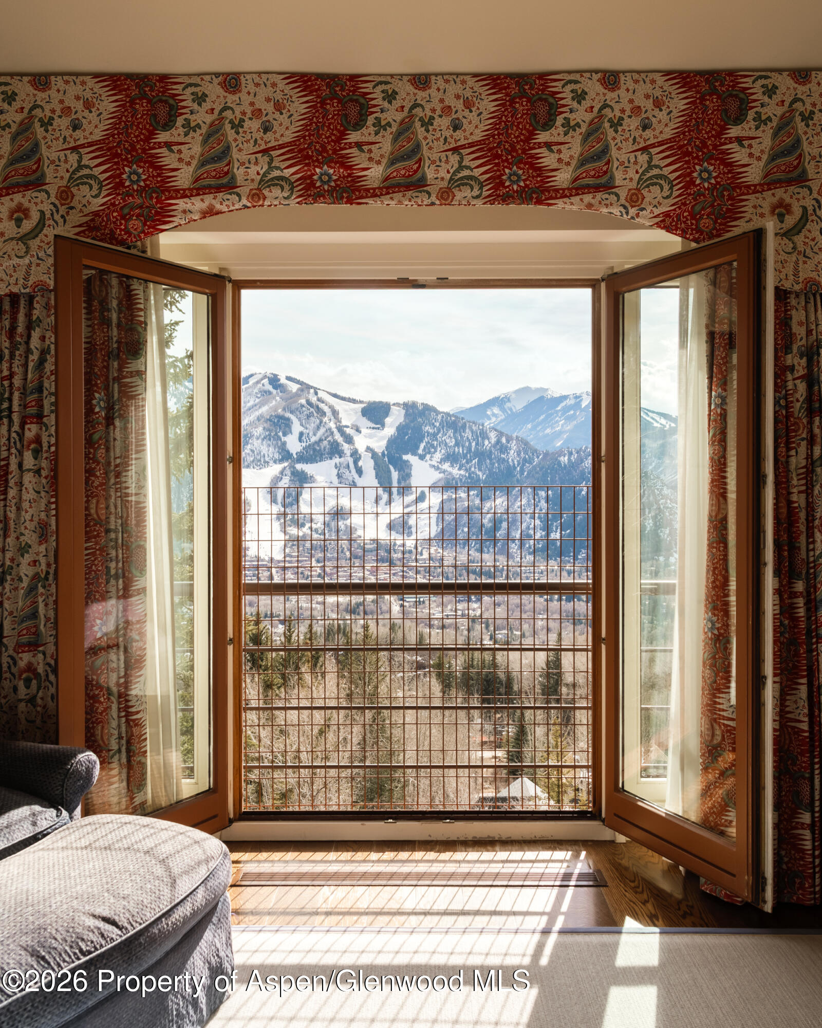 2131 Red Mountain Road Aspen, CO 81612 - Photo 18 of 31 a view of a living room area with a floor to ceiling window
