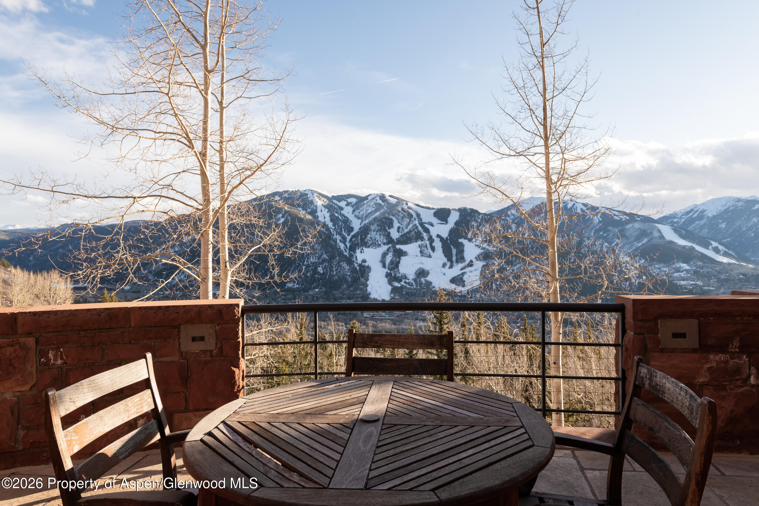 2131 Red Mountain Road Aspen, CO 81612 - Photo 25 of 31 a view of a chairs and table in the balcony