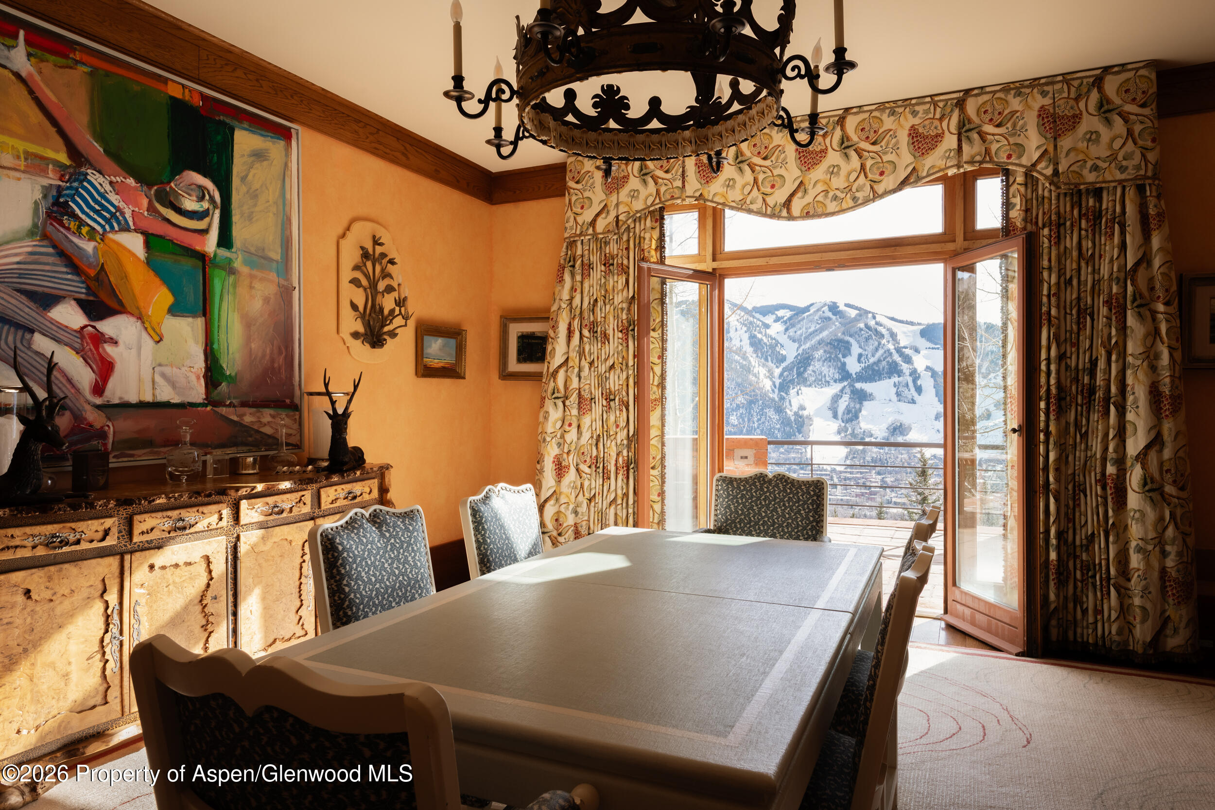 2131 Red Mountain Road Aspen, CO 81612 - Photo 6 of 31 a view of a dining room with furniture and a potted plant