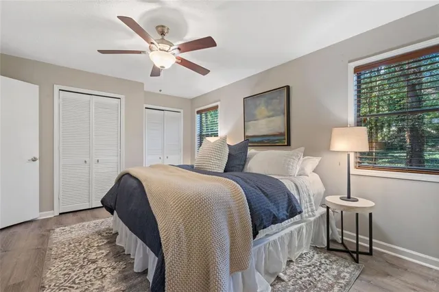 a bedroom with a bed and window