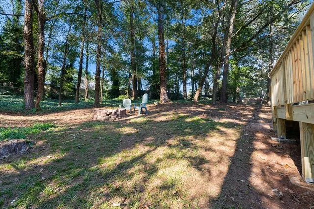 a view of backyard with tree