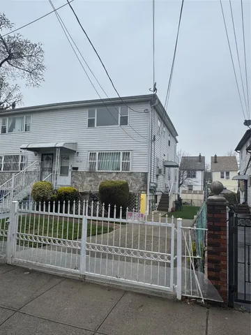 a view of a house with a deck