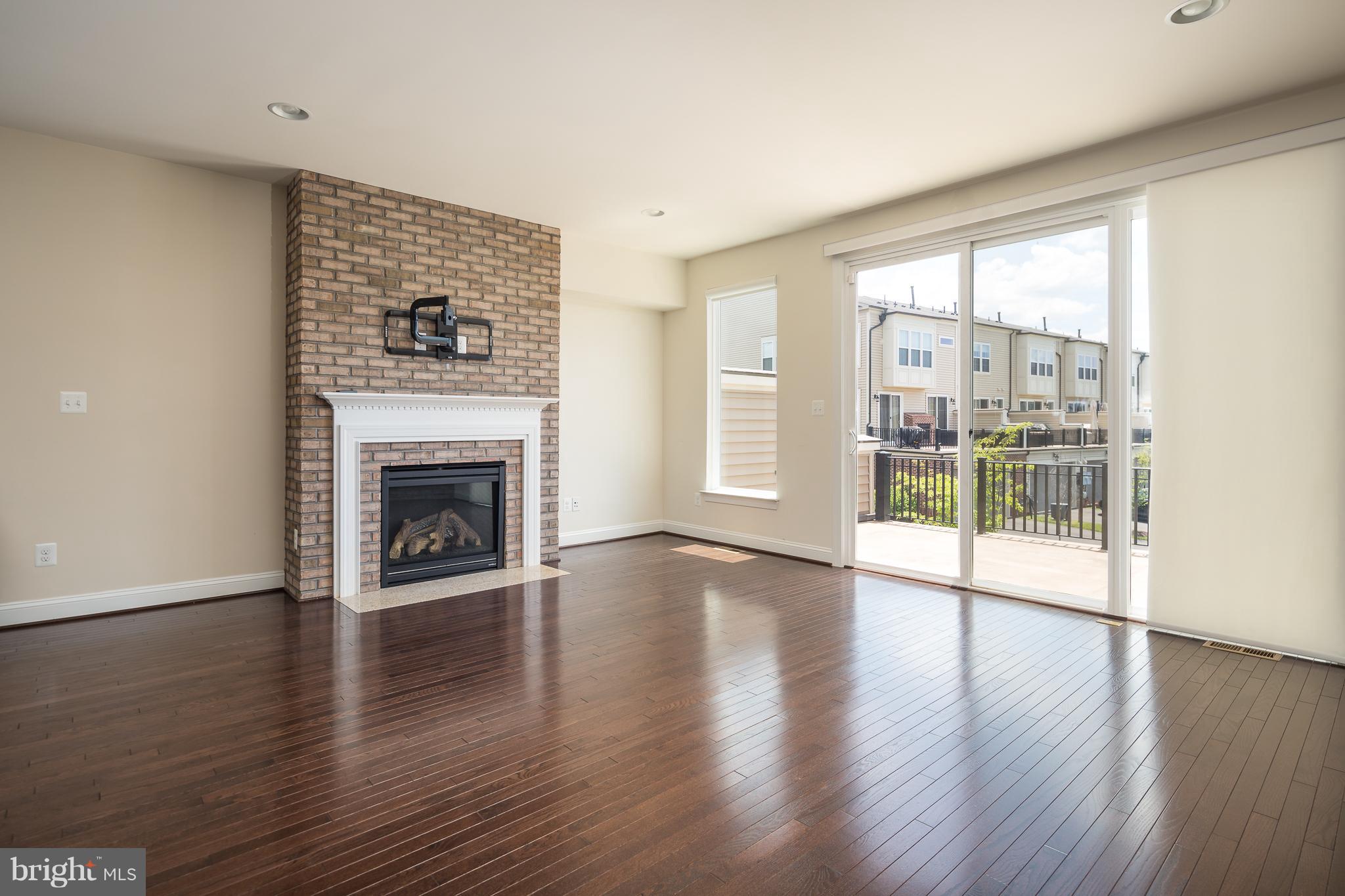 42287 Riggins Ridge Terrace Ashburn, VA 20148 - Photo 7 of 27 Family Room-OPENS TO BALCONY