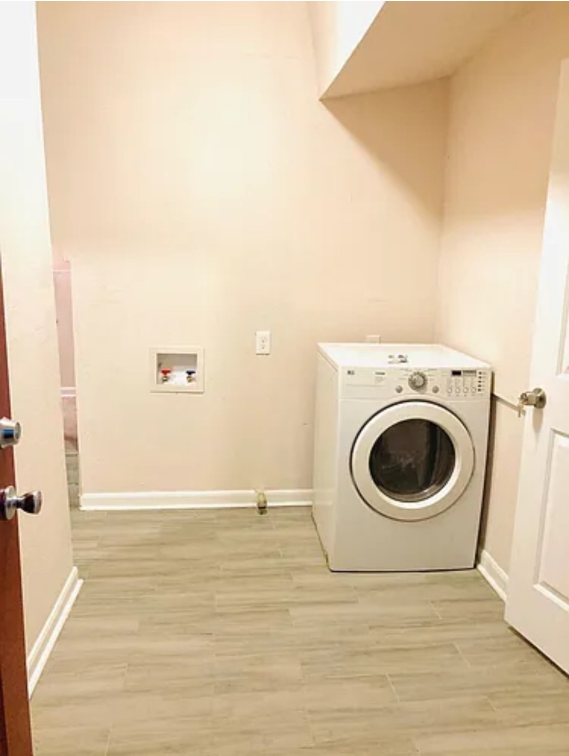 7339 Mountbatten Road Houston, TX 77033 - Photo 17 of 33 a view of a storage & utility room with a washer dryer