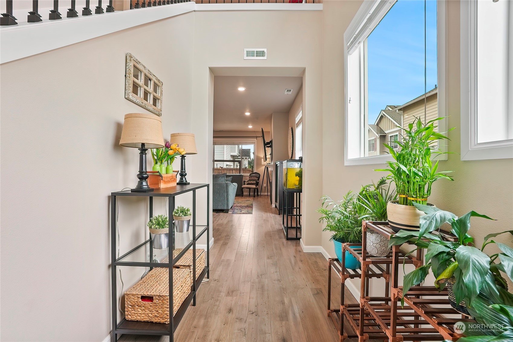 4424 233rd Place Southeast Bothell, WA 98021 - Photo 3 of 35 a view of hallway with furniture and a potted plant