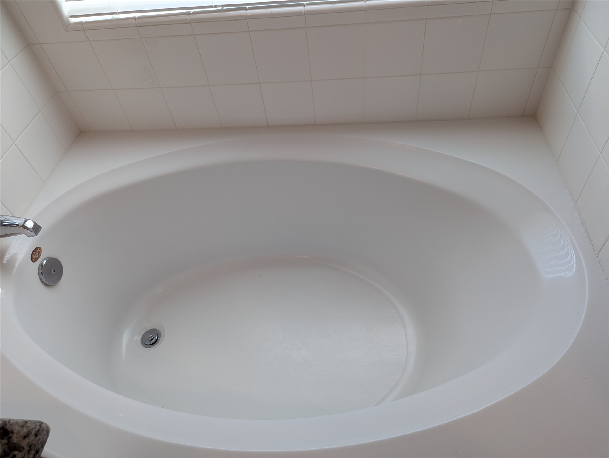 13319 Lansdown Street Rosharon, TX 77583 - Photo 13 of 22 a close up of a bathtub