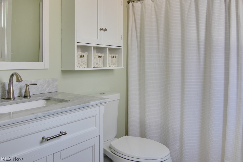 12945 Chamberlain Road Aurora, OH 44202 - Photo 12 of 30 Master Bath, new vanity, sink, plumbing fixtures, toilet and exhaust fan
