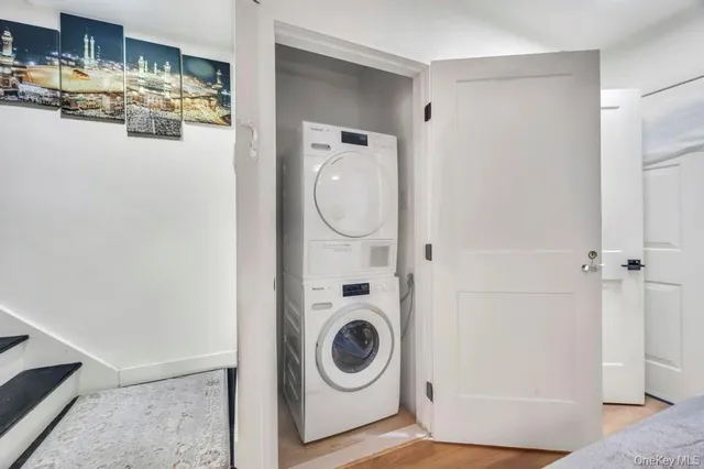 a view of a storage & utility room with washer and dryer