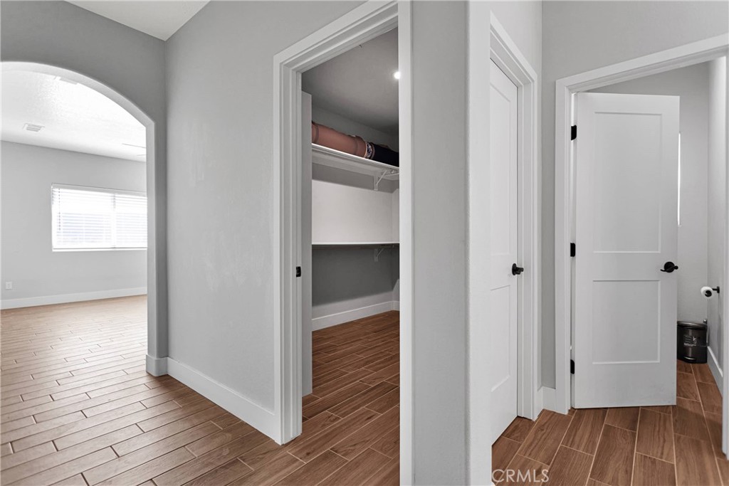 10055 Eaby Road Phelan, CA 92371 - Photo 12 of 19 a view of hallway with wooden floor