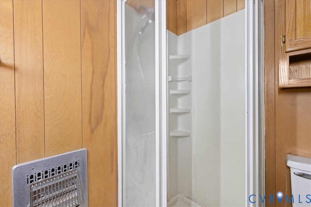 106 Sylvan Road Wakefield, VA 23888 - Photo 17 of 29 Full bath with a stall shower and toilet