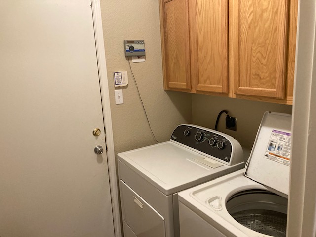4816 Norman Trail Austin, TX 78749 - Photo 18 of 19 a utility room with dryer and washer