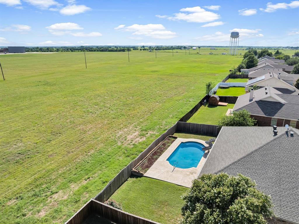 205 King George Road Ponder, TX 76259 - Photo 31 of 32 a view of an ocean from a building