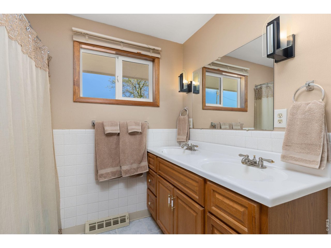 218 Bothun Road Berthoud, CO 80513 - Photo 13 of 35 Main floor shared full bathroom